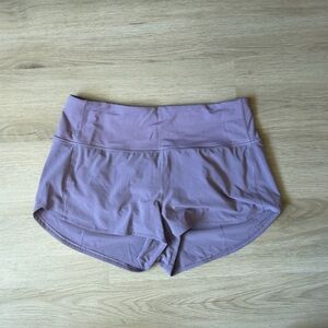Purple lululemon HR speed up shorts